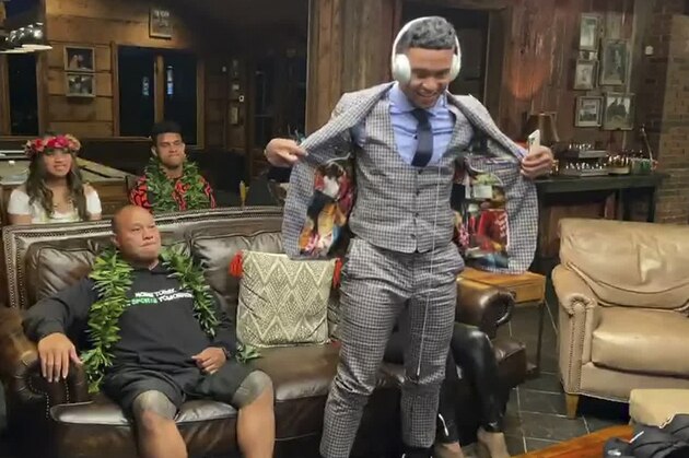In this still image from video provided by the NFL, Tua Tagovailoa shows off the lining of his jacket during the NFL football draft Thursday, April 23, 2020, in Alabaster, Ala. (NFL via AP)