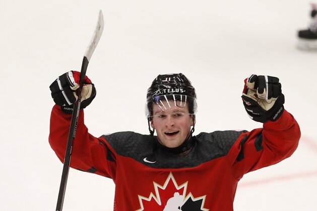 Canada's Alexis Lafreniere celebrates his sides first goal during the U20 Ice Hockey Worlds match between Canada and the United States in Ostrava, Czech Republic, Thursday, Dec. 26, 2019. (AP Photo/Petr David Josek)
