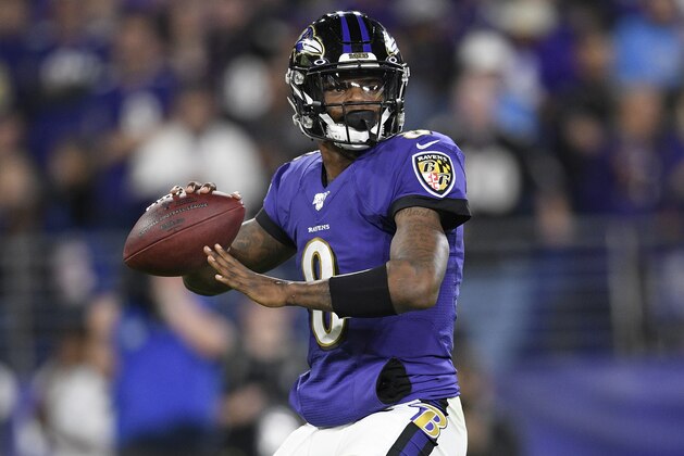 Baltimore Ravens quarterback Lamar Jackson (8) looks to pass during the first half an NFL divisional playoff football game against the Tennessee Titans, Saturday, Jan. 11, 2020, in Baltimore. (AP Photo/Nick Wass)