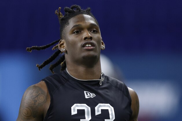INDIANAPOLIS, IN - FEBRUARY 27: Wide receiver CeeDee Lamb of Oklahoma runs a drill during the NFL Scouting Combine at Lucas Oil Stadium on February 27, 2020 in Indianapolis, Indiana. (Photo by Joe Robbins/Getty Images)
