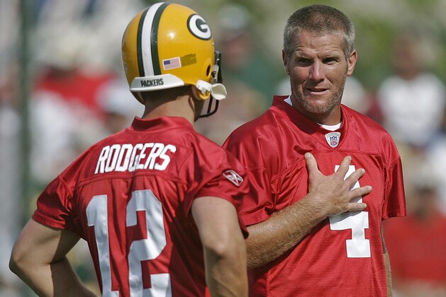 Green Bay Packers quarterbacks Brett Favre and Aaron Rodgers talk during football training camp Tuesday, Aug. 1, 2006, in Green Bay, Wis. (AP Photo/Morry Gash) Green Bay Packers quarterbacks Brett Favre and Aaron Rodgers talk during football training camp Tuesday, Aug. 1, 2006, in Green Bay, Wis. (AP Photo/Morry Gash)