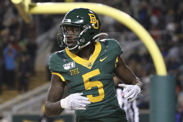 Baylor wide receiver Denzel Mims (5) looks over to the side line after a touchdown in an NCAA college football game against West Virginia in Waco, Texas, Thursday, Oct. 31, 2019. (AP Photo/Jerry Larson) Baylor wide receiver Denzel Mims (5) looks over to the side line after a touchdown in an NCAA college football game against West Virginia in Waco, Texas, Thursday, Oct. 31, 2019. (AP Photo/Jerry Larson)