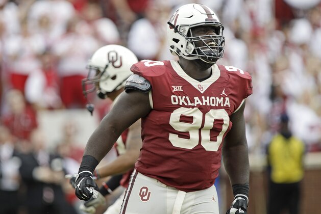 NORMAN, OK - SEPTEMBER 29: Defensive lineman Neville Gallimore #90 of the Oklahoma Sooners celebrates a quarterback sack against the Baylor Bears at Gaylord Family Oklahoma Memorial Stadium on September 29, 2018 in Norman, Oklahoma. (Photo by Brett Deering/Getty Images)