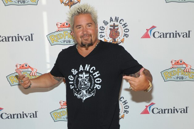 IMAGE DISTRIBUTED FOR CARNIVAL CRUISE LINE - Food Network Star Guy Fieri attends Carnival’s Summertime Beer-B-Que featuring food from his new Pig & Anchor Bar-B-Que Smokehouse, exclusively on Carnival Cruise Line, Wednesday, July 27, 2016, in New York.  (Diane Bondareff/ AP Images for Carnival Cruise Line)
