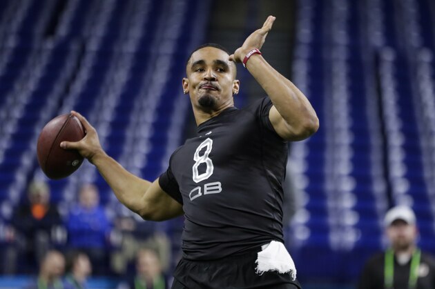 Oklahoma quarterback Jalen Hurts runs a drill at the NFL football scouting combine in Indianapolis, Thursday, Feb. 27, 2020. (AP Photo/Michael Conroy)