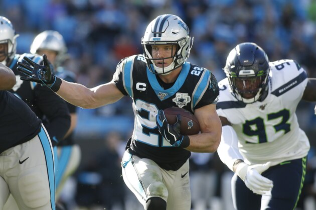 Carolina Panthers running back Christian McCaffrey (22) runs against the Seattle Seahawks during the second half of an NFL football game in Charlotte, N.C., Sunday, Dec. 15, 2019. (AP Photo/Brian Blanco)