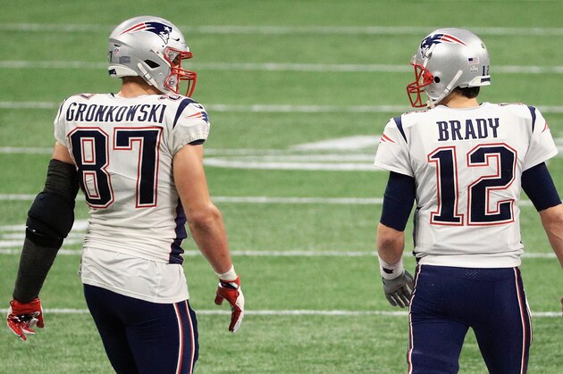 ATLANTA, GA - FEBRUARY 03: Rob Gronkowski #87 of the New England Patriots talks with Tom Brady #12 in the second half during Super Bowl LIII at Mercedes-Benz Stadium on February 3, 2019 in Atlanta, Georgia.  (Photo by Mike Ehrmann/Getty Images)
