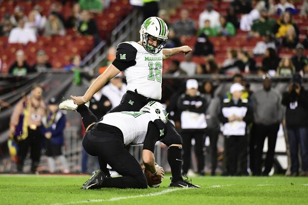 TAMPA, FLORIDA - DECEMBER 20: Justin Rohrwasser #16 of the Marshall Thundering Herd kicks an extra point during the first quarter against the South Florida Bulls in the Gasparilla Bowl at Raymond James Stadium on December 20, 2018 in Tampa, Florida. (Photo by Julio Aguilar/Getty Images)