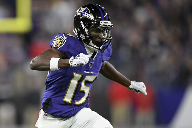 Baltimore Ravens wide receiver Marquise Brown (15) runs on the field during the first half an NFL divisional playoff football game against the Tennessee Titans, Saturday, Jan. 11, 2020, in Baltimore. (AP Photo/Nick Wass)