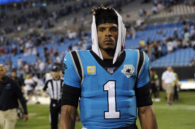 Carolina Panthers quarterback Cam Newton (1) walks off the field following the Panthers 20-14 loss to the Tampa Bay Buccaneers following an NFL football game in Charlotte, N.C., Friday, Sept. 13, 2019. (AP Photo/Mike McCarn)