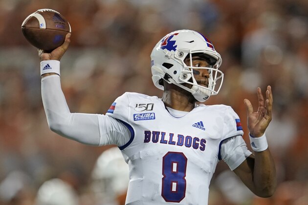 Louisiana Tech's J'Mar Smith (8) looks to pass against Texas during the first half of an NCAA college football game in Austin, Texas, Saturday, Aug. 31, 2019. (AP Photo/Chuck Burton)