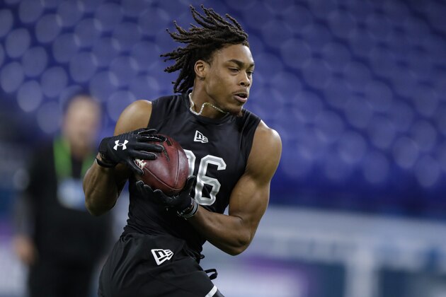LSU wide receiver Justin Jefferson runs a drill at the NFL football scouting combine in Indianapolis, Thursday, Feb. 27, 2020. (AP Photo/Michael Conroy)