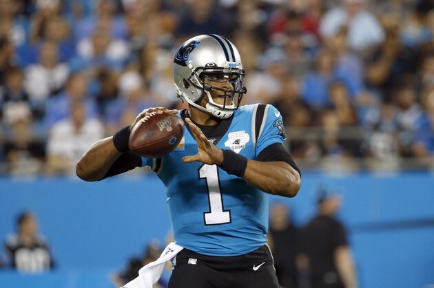 Carolina Panthers quarterback Cam Newton (1) passes against the Tampa Bay Buccaneers during the first half of an NFL football game in Charlotte, N.C., Thursday, Sept. 12, 2019. (AP Photo/Brian Blanco)