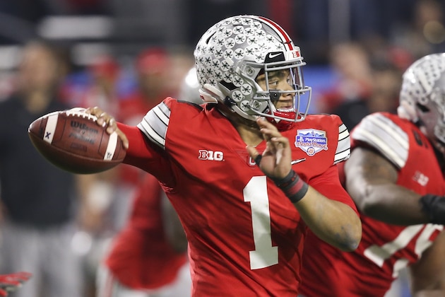 Ohio State quarterback Justin Fields throws a pass against Clemson during the second half of the Fiesta Bowl NCAA college football playoff semifinal Saturday, Dec. 28, 2019, in Glendale, Ariz. (AP Photo/Ross D. Franklin)