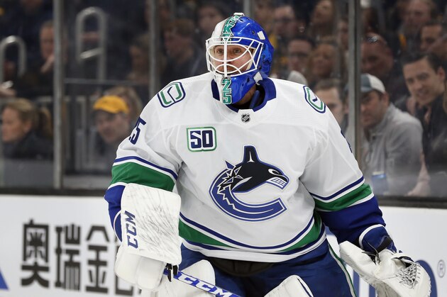 Vancouver Canucks' Jacob Markstrom plays against the Boston Bruins during an NHL hockey game in Boston, Tuesday, Feb. 4, 2020. (AP Photo/Michael Dwyer)
