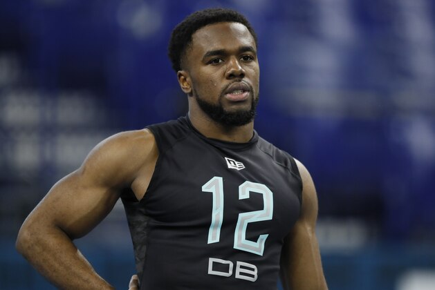 Utah defensive back Javelin K. Guidry watches the 40-yard dash at the NFL football scouting combine in Indianapolis, Sunday, March 1, 2020. (AP Photo/Charlie Neibergall)