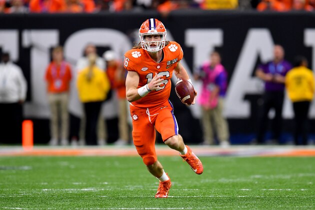 NEW ORLEANS, LOUISIANA - JANUARY 13: Trevor Lawrence #16 of the Clemson Tigers runs with the ball during the fourth quarter of the College Football Playoff National Championship game against the LSU Tigers at the Mercedes Benz Superdome on January 13, 2020 in New Orleans, Louisiana. The LSU Tigers topped the Clemson Tigers, 42-25. (Photo by Alika Jenner/Getty Images)