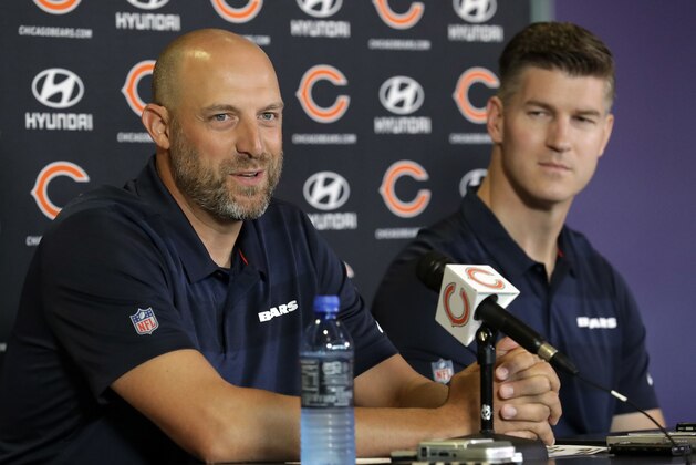 FILE - In this July 19, 2018, file photo, Chicago Bears head coach Matt Nagy, left, speaks as general manager Ryan Pace looks on at a news conference during an NFL football training camp in Bourbonnais, Ill. A worst-to-first jump last season left the Bears staring down at the rest of the NFC North, armed and loaded with one of the league’s best defenses and banking on a more creative offense led by quarterback Mitchell Trubisky to improve Nagy’s second season. As good as it all sounds, Pace was not resting easy the past few months.(AP Photo/Nam Y. Huh, File)