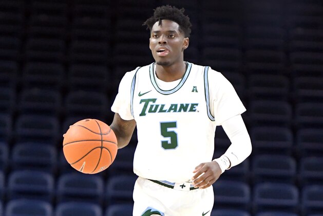 WASHINGTON, DC - DECEMBER 20:  Teshaun Hightower #5 of the Tulane Green Wave dribbles up court during a first round DC Holiday Fest college basketball game against the Akron Zips at the Entertainment & Sports Arena on December 20, 2019 in Washington, DC.  (Photo by Mitchell Layton/Getty Images)