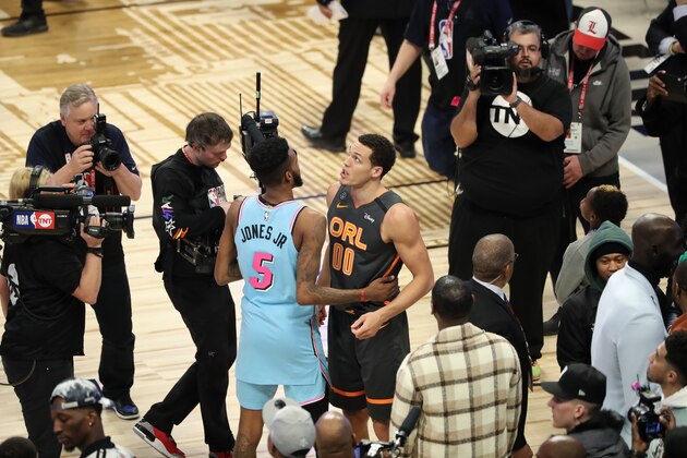 CHICAGO, IL - FEBRUARY 15: Derrick Jones Jr. #5 of the Miami Heat and Aaron Gordon #00 of the Orlando Magic hug during the 2020 NBA All-Star - AT&T Slam Dunk on February 15, 2020 at the United Center in Chicago, Illinois. NOTE TO USER: User expressly acknowledges and agrees that, by downloading and or using this photograph, User is consenting to the terms and conditions of the Getty Images License Agreement. Mandatory Copyright Notice: Copyright 2020 NBAE (Photo by Joe Murphy/NBAE via Getty Images)