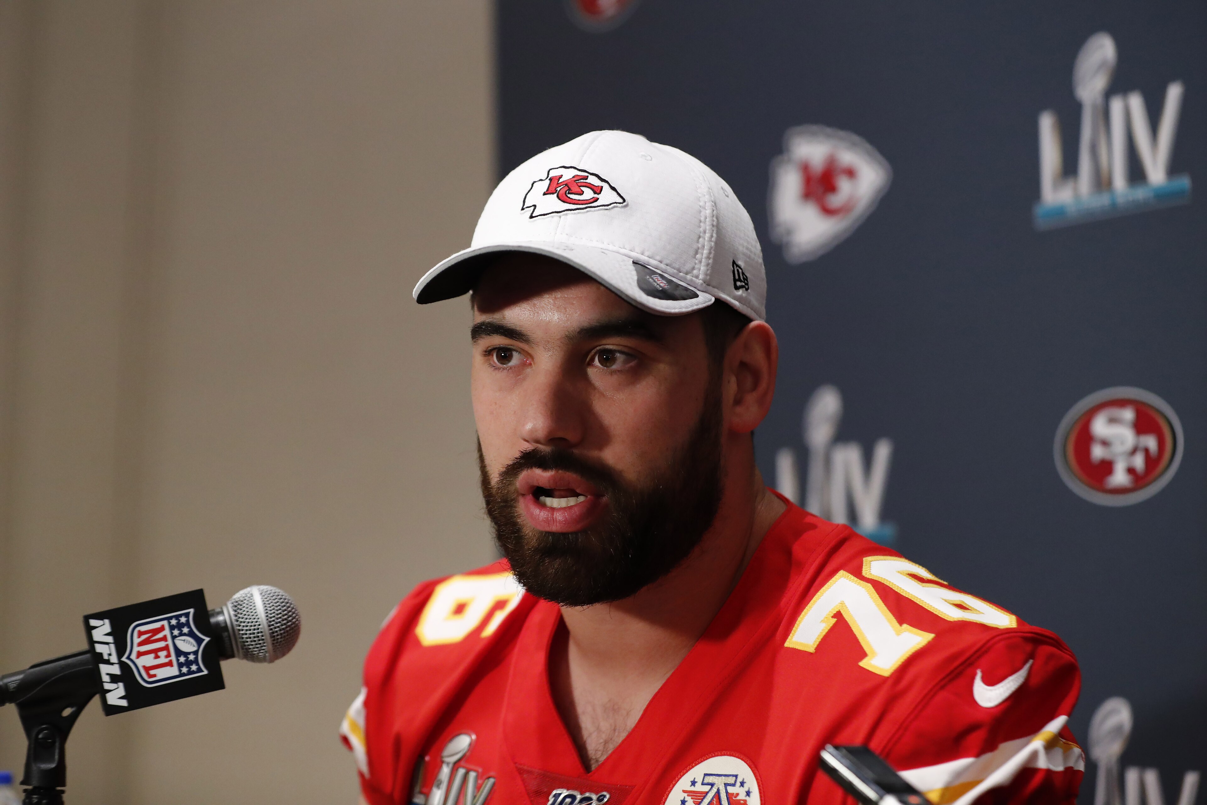 In this Wednesday, Jan. 29, 2020 photo, Kansas City Chiefs offensive guard Laurent Duvernay-Tardif (76) speaks during a news conference in Aventura, Fla., for the NFL Super Bowl 54 football game. (AP Photo/Brynn Anderson)
