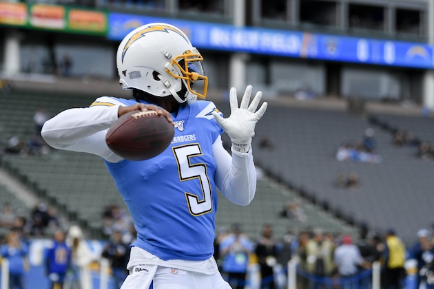 Los Angeles Chargers quarterback Tyrod Taylor warms up prior to an NFL football game against the Oakland Raiders in Carson, Calif., Sunday, Dec. 22, 2019. (AP Photo/Kelvin Kuo)