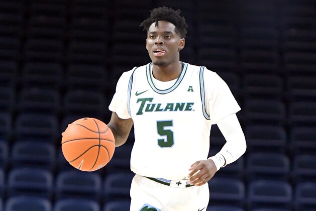 WASHINGTON, DC - DECEMBER 20: Teshaun Hightower #5 of the Tulane Green Wave dribbles up court during a first round DC Holiday Fest college basketball game against the Akron Zips at the Entertainment & Sports Arena on December 20, 2019 in Washington, DC. (Photo by Mitchell Layton/Getty Images) WASHINGTON, DC - DECEMBER 20: Teshaun Hightower #5 of the Tulane Green Wave dribbles up court during a first round DC Holiday Fest college basketball game against the Akron Zips at the Entertainment & Sports Arena on December 20, 2019 in Washington, DC. (Photo by Mitchell Layton/Getty Images)