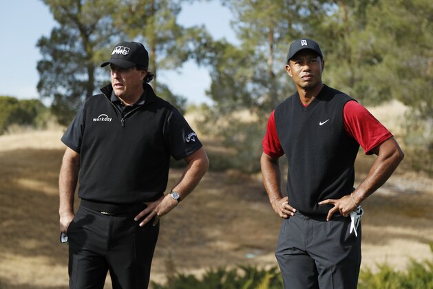 Phil Mickelson, left, and Tiger Woods stand at the first tee before a golf match at Shadow Creek golf course, Friday, Nov. 23, 2018, in Las Vegas. (AP Photo/John Locher) Phil Mickelson, left, and Tiger Woods stand at the first tee before a golf match at Shadow Creek golf course, Friday, Nov. 23, 2018, in Las Vegas. (AP Photo/John Locher)