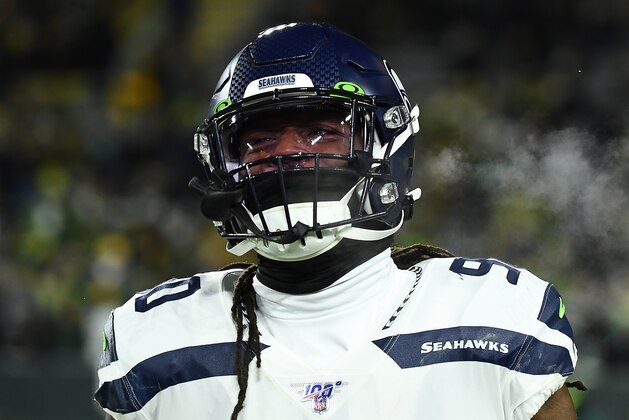 GREEN BAY, WISCONSIN - JANUARY 12: Jadeveon Clowney #90 of the Seattle Seahawks looks on before the NFC Divisional Playoff game against the Green Bay Packers at Lambeau Field on January 12, 2020 in Green Bay, Wisconsin. (Photo by Stacy Revere/Getty Images)