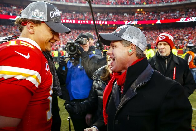 KANSAS CITY, MO - JANUARY 19: Clark Hunt, CEO and chairman of the Kansas City Chiefs, greets Patrick Mahomes #15 of the Kansas City Chiefs on the football field during the celebration of the team's victory over the Tennessee Titans in the AFC Championship game at Arrowhead Stadium on January 19, 2020 in Kansas City, Missouri. (Photo by David Eulitt/Getty Images)