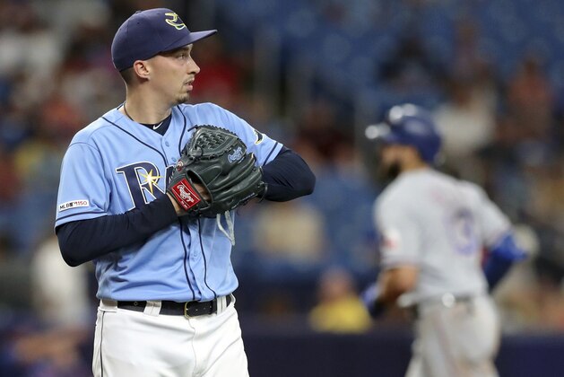 Tampa Bay Rays starting pitcher Blake Snell reacts after giving up a two-run home run to Texas Rangers' Joey Gallo during the fourth inning of a baseball game Sunday, June 30, 2019, in St. Petersburg, Fla. (AP Photo/Mike Carlson)
