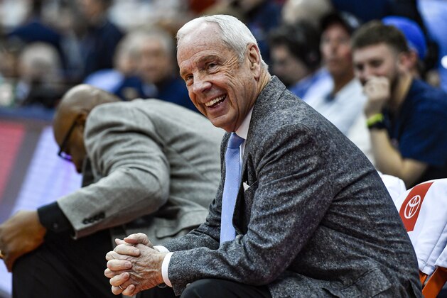 North Carolina head coach Roy Williams waits on the bench before an NCAA college basketball game against Syracuse in Syracuse, N.Y., Saturday, Feb. 29, 2020. North Carolina beat Syracuse 92-79. (AP Photo/Adrian Kraus)