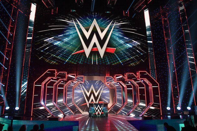LAS VEGAS, NEVADA - OCTOBER 11:  WWE logos are shown on screens before a WWE news conference at T-Mobile Arena on October 11, 2019 in Las Vegas, Nevada. It was announced that WWE wrestler Braun Strowman will face heavyweight boxer Tyson Fury and WWE champion Brock Lesnar will take on former UFC heavyweight champion Cain Velasquez at the WWE's Crown Jewel event at Fahd International Stadium in Riyadh, Saudi Arabia on October 31.  (Photo by Ethan Miller/Getty Images)