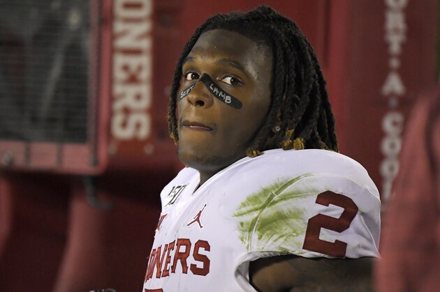 Oklahoma wide receiver CeeDee Lamb sits on the sideline during the second half of an NCAA college football game against UCLA Saturday, Sept. 14, 2019, in Pasadena, Calif. (AP Photo/Mark J. Terrill)