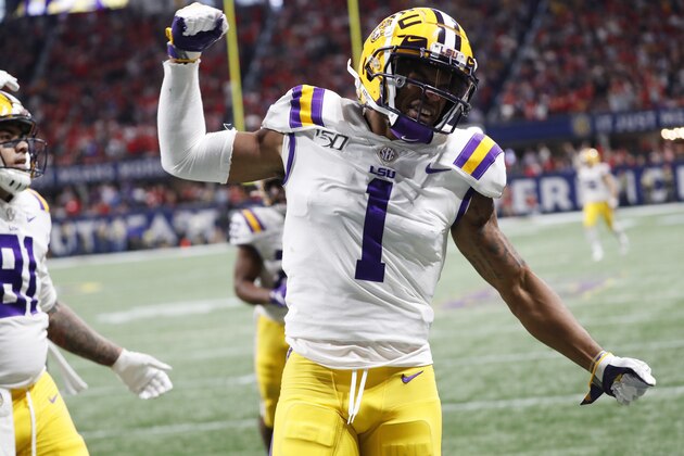 LSU wide receiver Ja'Marr Chase (1) celebrates his touchdown against Georgia during the first half of the Southeastern Conference championship NCAA college football game, Saturday, Dec. 7, 2019, in Atlanta. (AP Photo/John Bazemore)