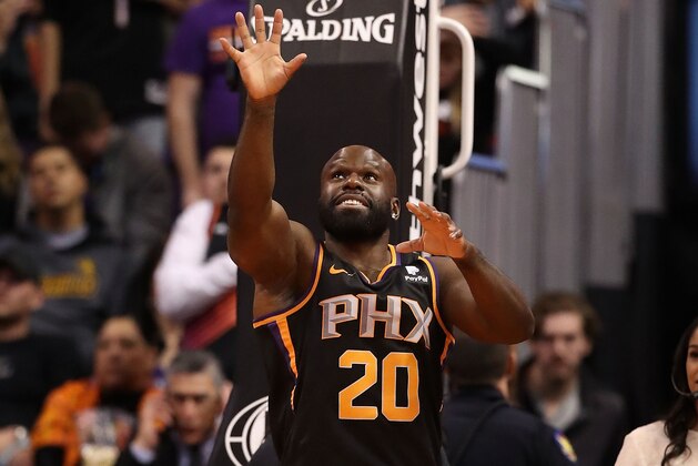 PHOENIX, ARIZONA - JANUARY 24:  WWE star Apollo Crews performs during a break from the second half of the NBA game between the Phoenix Suns and the Portland Trail Blazers at Talking Stick Resort Arena on January 24, 2019 in Phoenix, Arizona. (Photo by Christian Petersen/Getty Images)