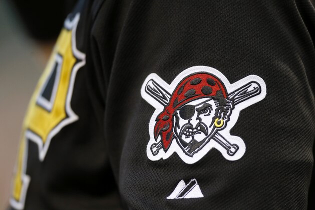 One of the Pittsburgh Pirates logos is seen on a jersey of Garrett Jones during the baseball game between the Pittsburgh Pirates and the Milwaukee Brewers on Friday, June 28, 2013, in Pittsburgh. (AP Photo/Keith Srakocic) One of the Pittsburgh Pirates logos is seen on a jersey of Garrett Jones during the baseball game between the Pittsburgh Pirates and the Milwaukee Brewers on Friday, June 28, 2013, in Pittsburgh. (AP Photo/Keith Srakocic)