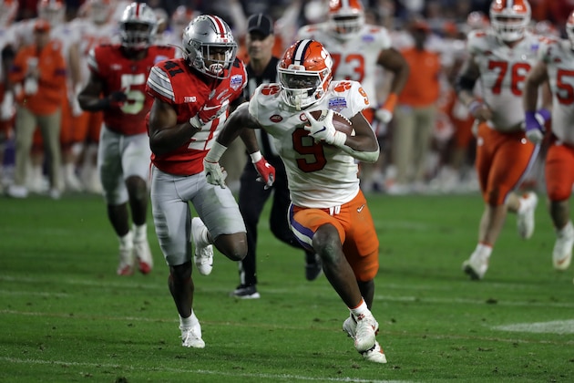 Clemson running back Travis Etienne (9) during the first half of the Fiesta Bowl NCAA college football game against Ohio State, Saturday, Dec. 28, 2019, in Glendale, Ariz. (AP Photo/Rick Scuteri).