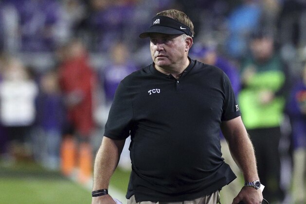 TCU head coach Gary Patterson walks on the field in the fourth quarter in an NCAA college football game against West Virginia Friday, Nov. 29, 2019, in Fort Worth, Texas. (AP Photo/Richard W. Rodriguez)