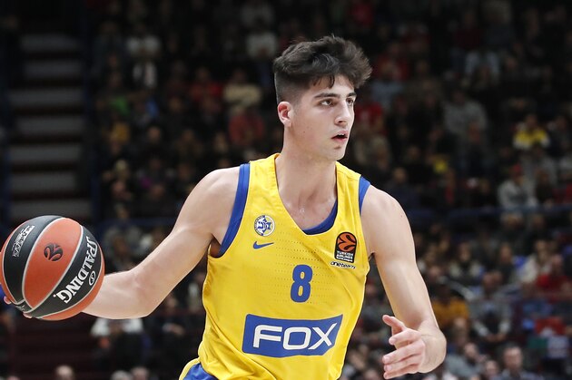 Maccabi Fox Tel Aviv's Deni Avdija controls the ball during the Euro League basketball match between Olimpia Milan and Maccabi Fox Tel Aviv, in Milan, Italy, Tuesday, Nov. 19, 2019. (AP Photo/Antonio Calanni)
