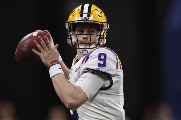 LSU quarterback Joe Burrow (9) works against Georgia during the second half of the Southeastern Conference championship NCAA college football game, Saturday, Dec. 7, 2019, in Atlanta. (AP Photo/John Bazemore) LSU quarterback Joe Burrow (9) works against Georgia during the second half of the Southeastern Conference championship NCAA college football game, Saturday, Dec. 7, 2019, in Atlanta. (AP Photo/John Bazemore)