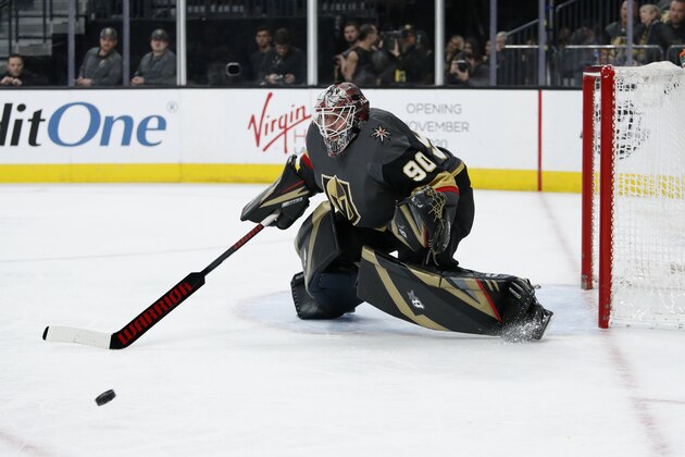 Vegas Golden Knights goaltender Robin Lehner (90) plays against the New Jersey Devils during the first period of an NHL hockey game Tuesday, March 3, 2020, in Las Vegas. (AP Photo/John Locher)