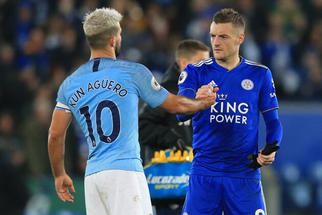 Leicester City's English striker Jamie Vardy (R) shakes hands with Manchester City's Argentinian striker Sergio Aguero (L) on the pitch after the English Premier League football match between Leicester City and Manchester City at King Power Stadium in Leicester, central England on December 26, 2018. - Leicester won the game 2-1. (Photo by Lindsey PARNABY / AFP) / RESTRICTED TO EDITORIAL USE. No use with unauthorized audio, video, data, fixture lists, club/league logos or 'live' services. Online in-match use limited to 120 images. An additional 40 images may be used in extra time. No video emulation. Social media in-match use limited to 120 images. An additional 40 images may be used in extra time. No use in betting publications, games or single club/league/player publications. /         (Photo credit should read LINDSEY PARNABY/AFP via Getty Images)