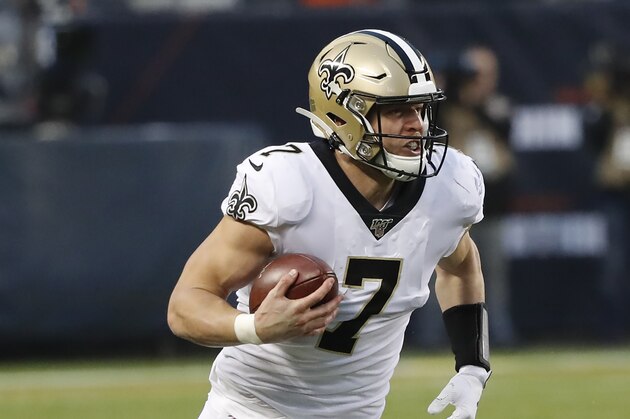 New Orleans Saints' Taysom Hill carries the ball during the second half of an NFL football game against the Chicago Bears in Chicago, Sunday, Oct. 20, 2019. (AP Photo/Charles Rex Arbogast)