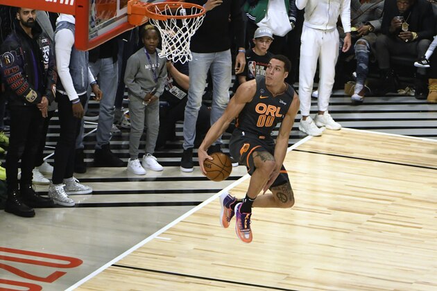 Orlando Magic's Aaron Gordon dunks dunks the ball during the NBA All-Star Slam Dunk contest Saturday, Feb. 15, 2020, in Chicago. (AP Photo/David Banks)