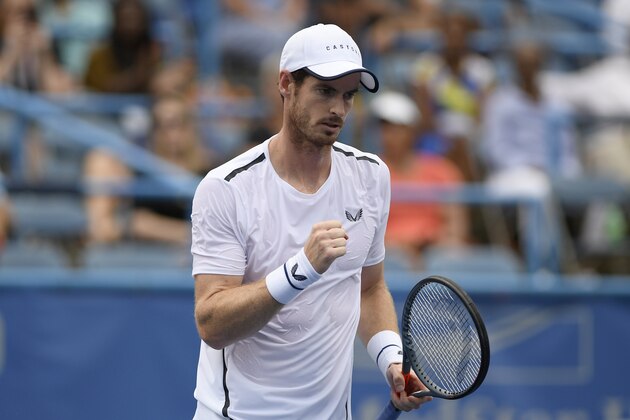 Andy Murray, of Britain, reacts as he and Jamie Murray played a doubles match in the Citi Open tennis tournament against Nicolas Mahut and Edouard Roger-Vasselin, both of France, Wednesday, July 31, 2019, in Washington. (AP Photo/Nick Wass)