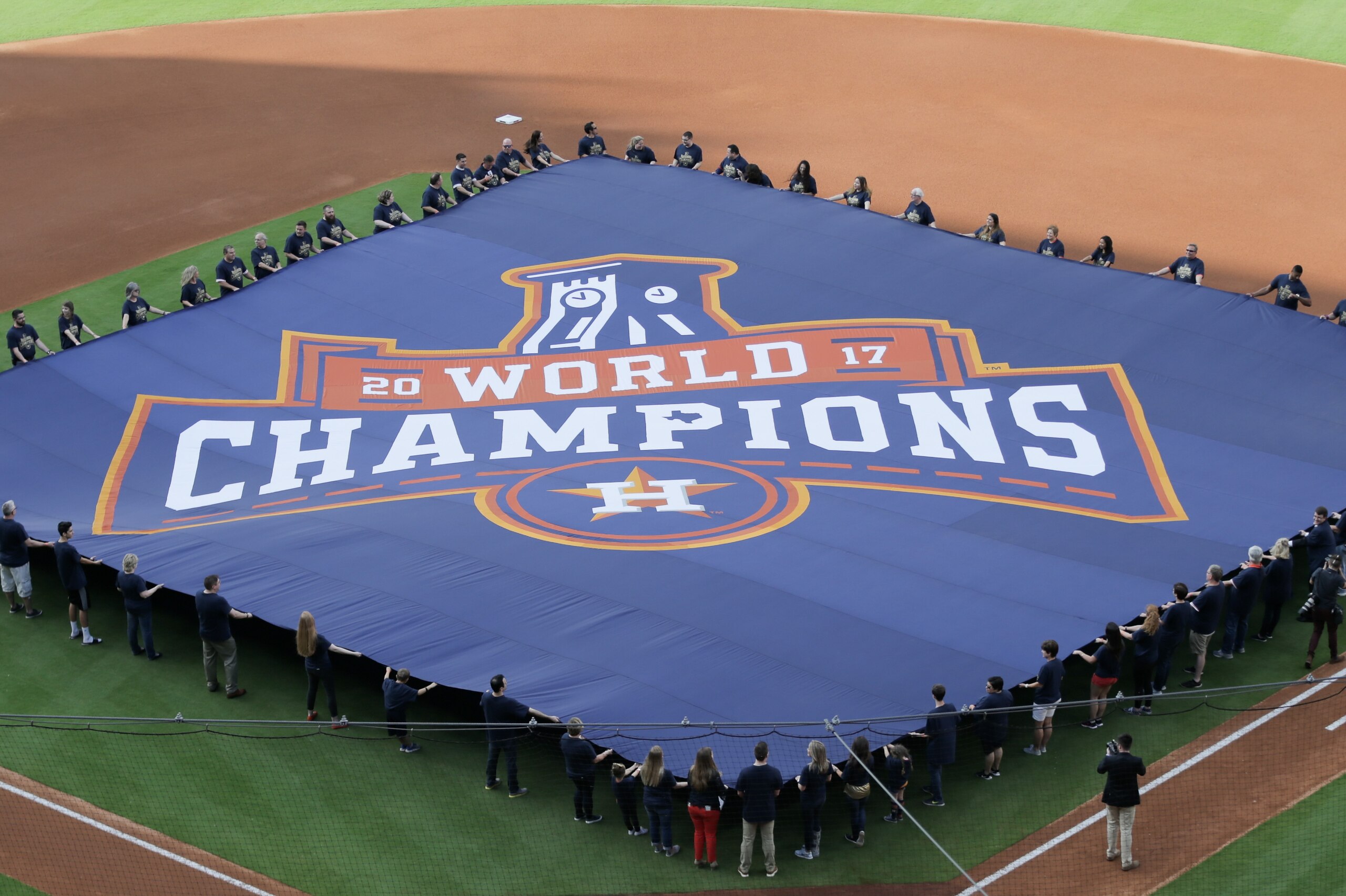 HOUSTON, TX - APRIL 02:  Houston Astros display a 2017 World Series Championship banner fduring pre-game ceremonies on Opening Day at Minute Maid Park on April 2, 2018 in Houston, Texas.  (Photo by Bob Levey/Getty Images)