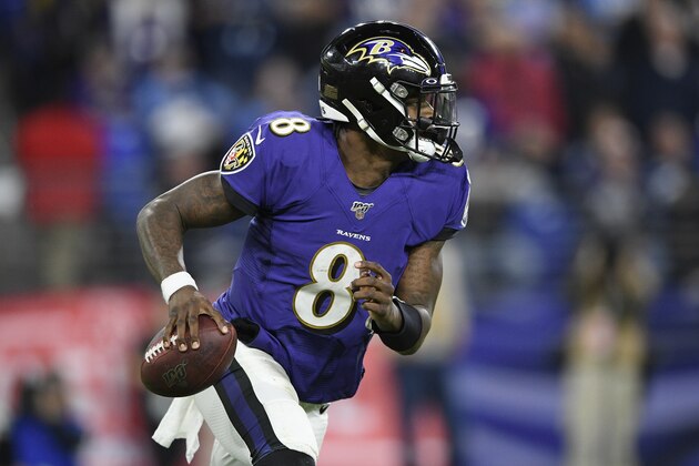 Baltimore Ravens quarterback Lamar Jackson (8) runs out of the backfield against the Tennessee Titans during the second half of an NFL divisional playoff football game, Saturday, Jan. 11, 2020, in Baltimore. (AP Photo/Nick Wass)