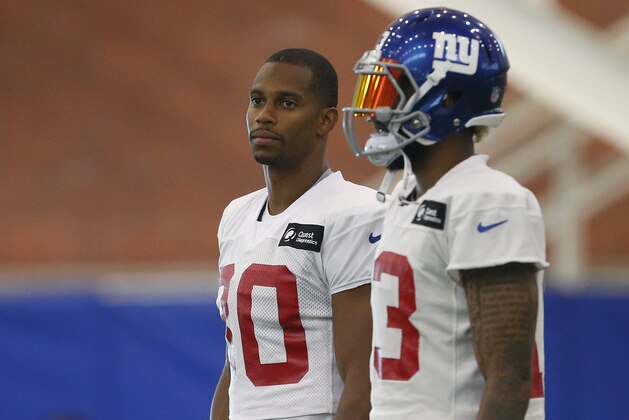 New York Giants wide receivers Victor Cruz (80) and Odell Beckham Jr. (13) stand together during a drill in practice at the team's NFL football camp, Sunday, July 31, 2016, in East Rutherford, N.J. (AP Photo/Rich Schultz)