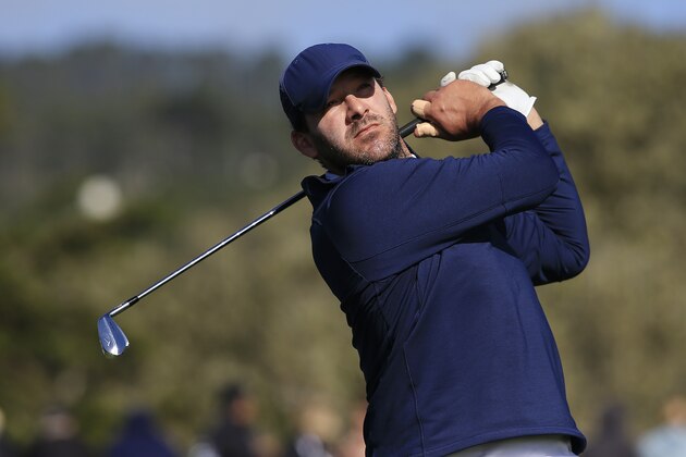 PEBBLE BEACH, CALIFORNIA - FEBRUARY 08: Former NFL player Tony Romo plays his shot from the 17th tee during the third round of the AT&T Pebble Beach Pro-Am at Pebble Beach Golf Links on February 08, 2020 in Pebble Beach, California. (Photo by Chris Trotman/Getty Images) PEBBLE BEACH, CALIFORNIA - FEBRUARY 08: Former NFL player Tony Romo plays his shot from the 17th tee during the third round of the AT&T Pebble Beach Pro-Am at Pebble Beach Golf Links on February 08, 2020 in Pebble Beach, California. (Photo by Chris Trotman/Getty Images)